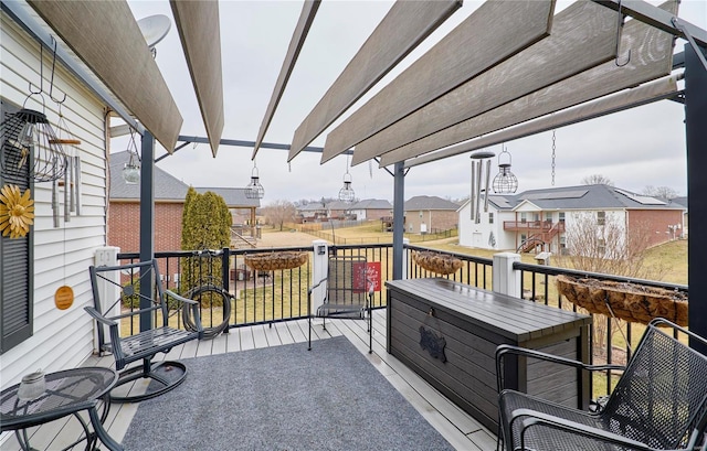 wooden terrace featuring a pergola