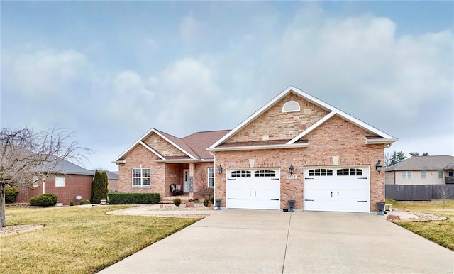 view of front of house with a garage and a front yard