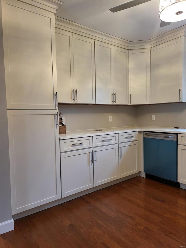 kitchen featuring white cabinetry, dark wood-style flooring, light countertops, and dishwasher