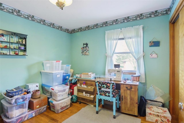 home office with hardwood / wood-style floors