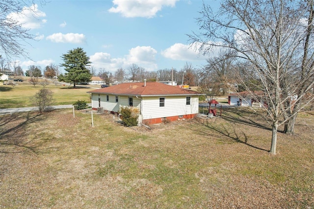 exterior space featuring a yard