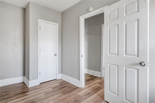 unfurnished bedroom with light hardwood / wood-style flooring