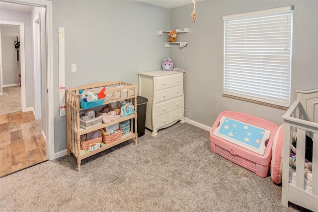 game room featuring light colored carpet