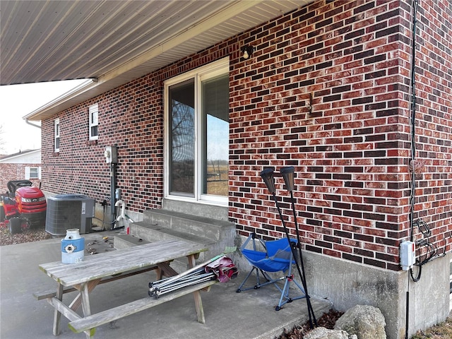 view of patio / terrace with entry steps and cooling unit