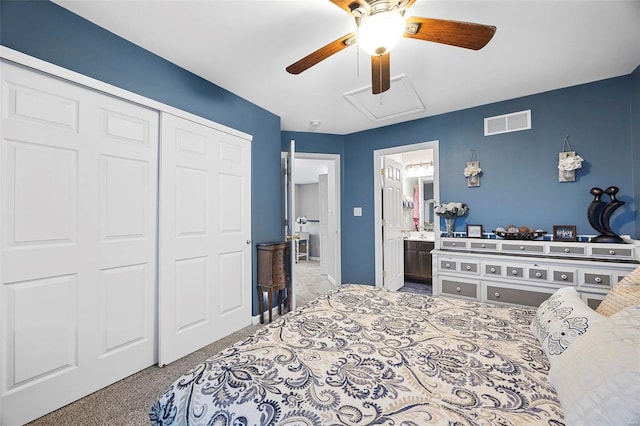 bedroom with ceiling fan, connected bathroom, carpet, and a closet