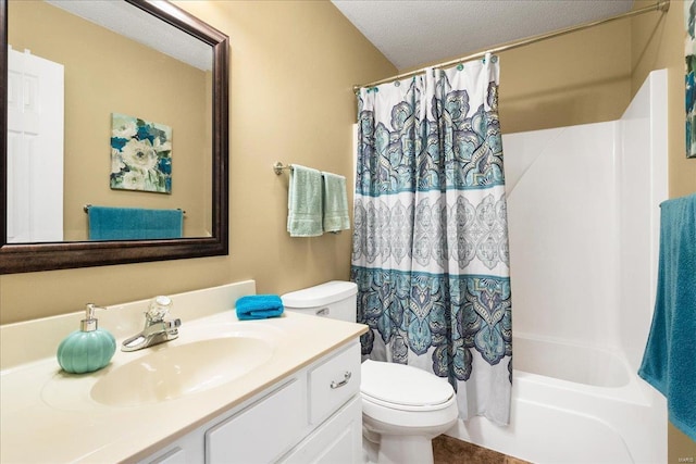 full bathroom featuring vanity, shower / tub combo, a textured ceiling, and toilet