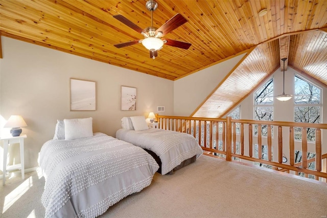 bedroom with lofted ceiling with beams, wooden ceiling, carpet flooring, and visible vents