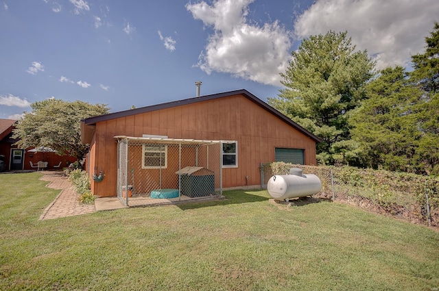 back of property with an outdoor structure