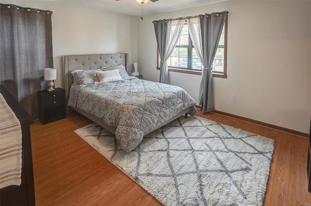 bedroom featuring hardwood / wood-style flooring