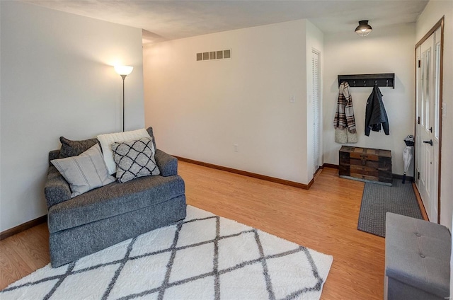 sitting room featuring hardwood / wood-style floors