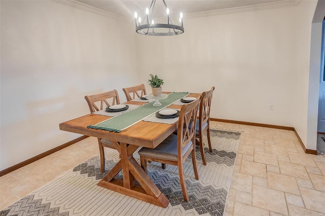 dining room featuring crown molding and a chandelier