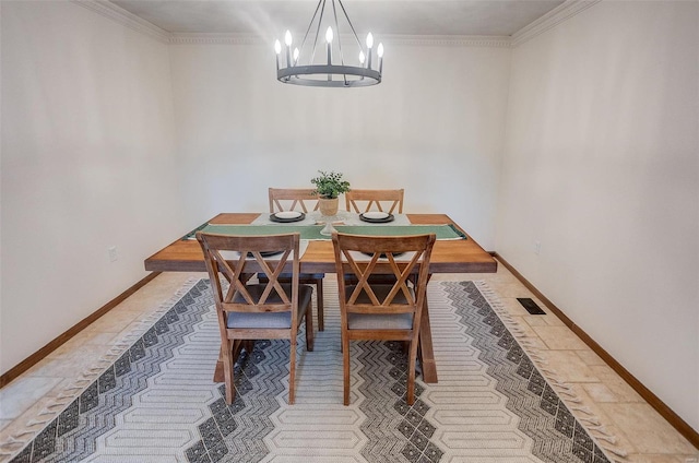 dining space featuring ornamental molding and a chandelier