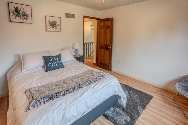 bedroom featuring hardwood / wood-style floors