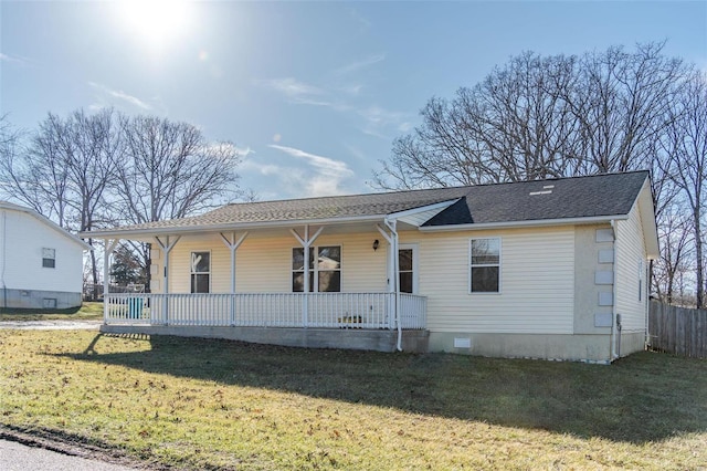 view of front of house featuring a front yard and covered porch