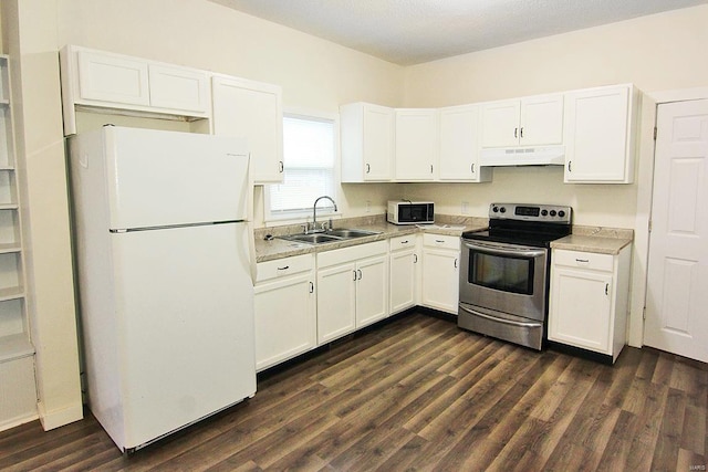 kitchen with dark wood-type flooring, sink, white refrigerator, stainless steel electric stove, and white cabinets