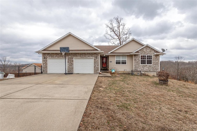 ranch-style house featuring a garage