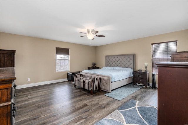 bedroom featuring ceiling fan and dark hardwood / wood-style floors