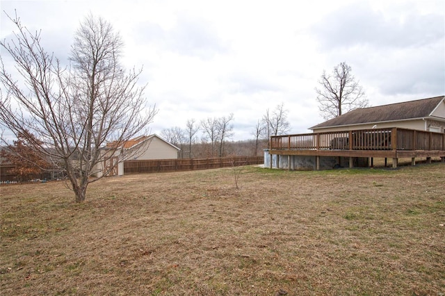 view of yard featuring a wooden deck