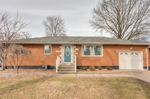 single story home with a garage and a front lawn