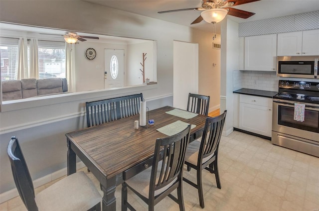 dining space with ceiling fan