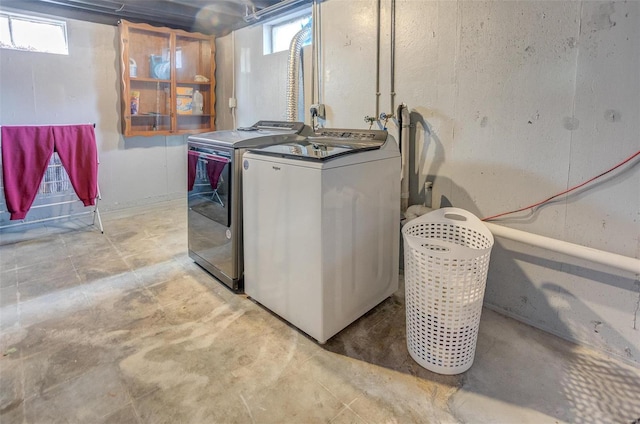 laundry room with washer and clothes dryer