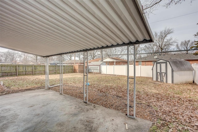 view of patio with a storage shed