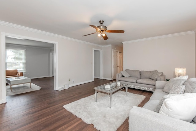 living room with dark hardwood / wood-style flooring, ornamental molding, and ceiling fan