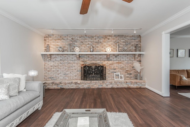 unfurnished living room featuring a brick fireplace, dark wood-type flooring, and ornamental molding