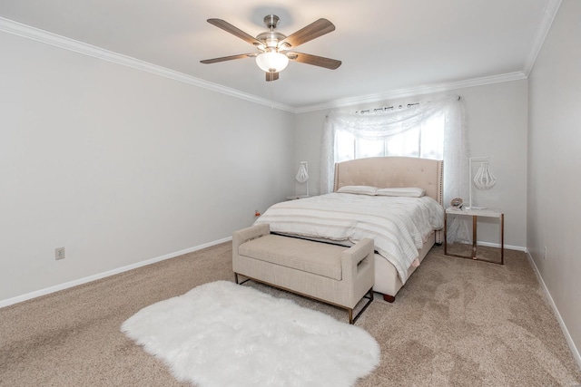 carpeted bedroom with crown molding and ceiling fan