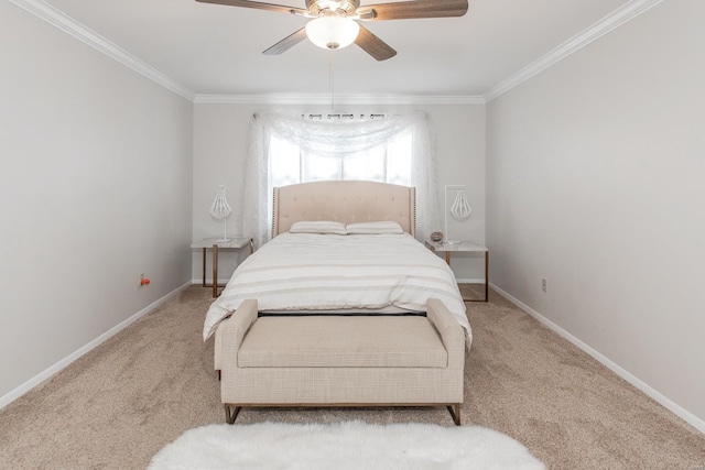 carpeted bedroom with crown molding and ceiling fan