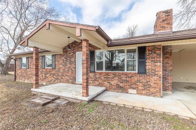 rear view of property with a patio area