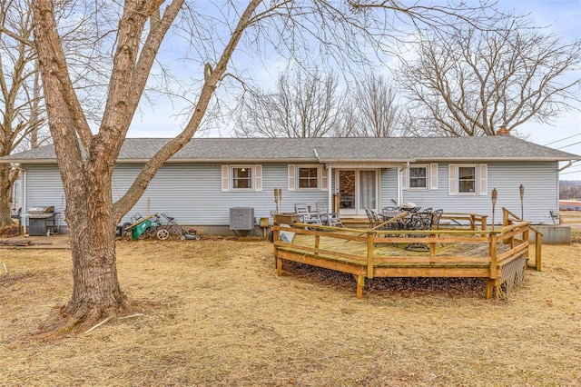 rear view of house with a deck