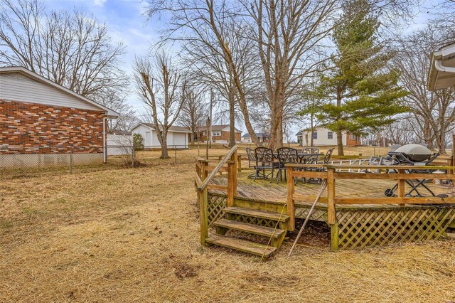 view of yard with a wooden deck