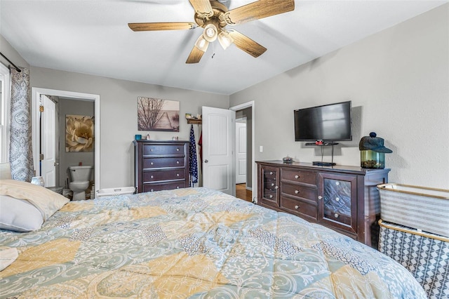 bedroom featuring ensuite bath and ceiling fan