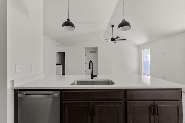 kitchen featuring sink, kitchen peninsula, hanging light fixtures, and dishwasher