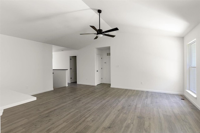 unfurnished room with lofted ceiling, hardwood / wood-style floors, plenty of natural light, and ceiling fan