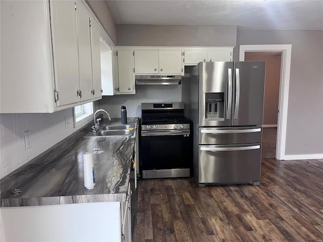 kitchen featuring stainless steel appliances, sink, white cabinets, and dark hardwood / wood-style floors