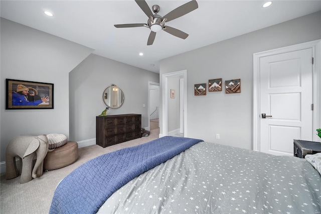 carpeted bedroom featuring baseboards, a ceiling fan, and recessed lighting