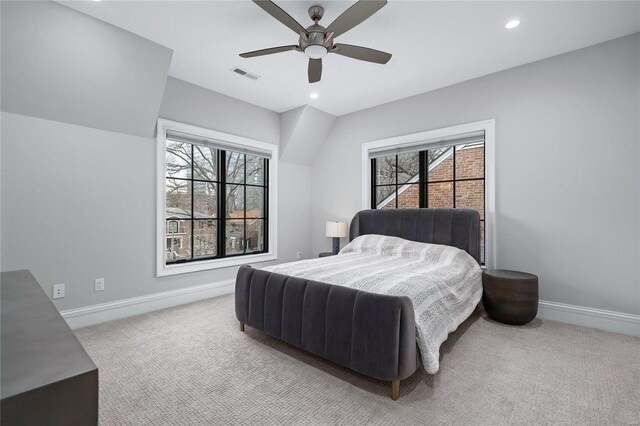 bedroom featuring recessed lighting, baseboards, visible vents, and light colored carpet