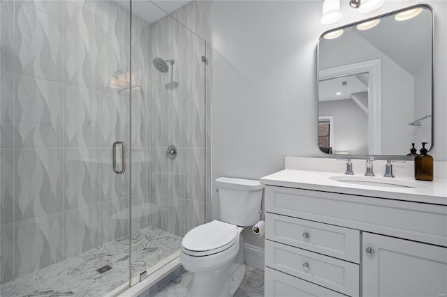 bathroom with a stall shower, marble finish floor, vanity, and toilet