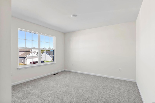 view of carpeted spare room