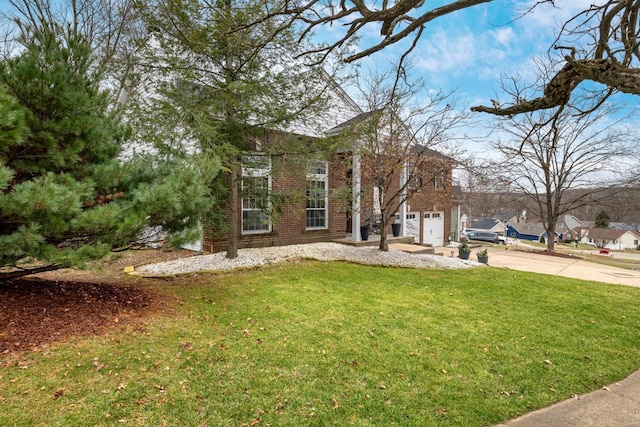 view of yard featuring a garage