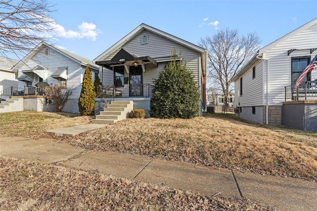 view of front of property featuring covered porch