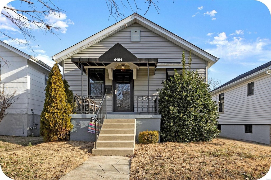 bungalow-style home with covered porch