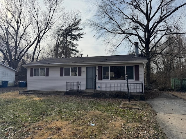 view of front of home with a front yard