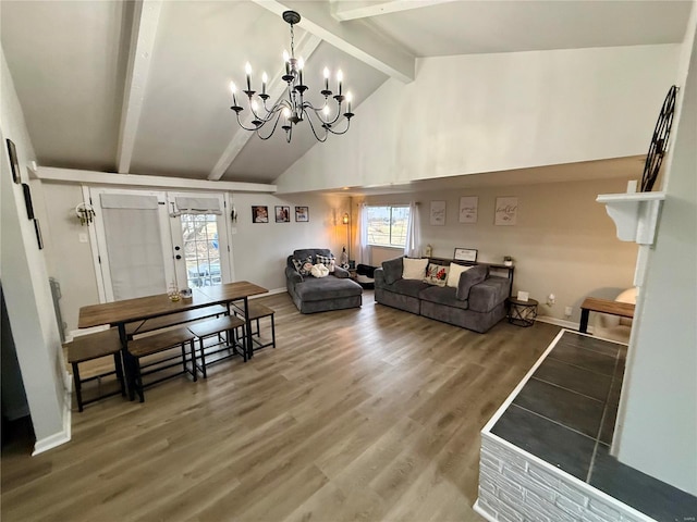 living room with hardwood / wood-style flooring, high vaulted ceiling, a chandelier, and beam ceiling