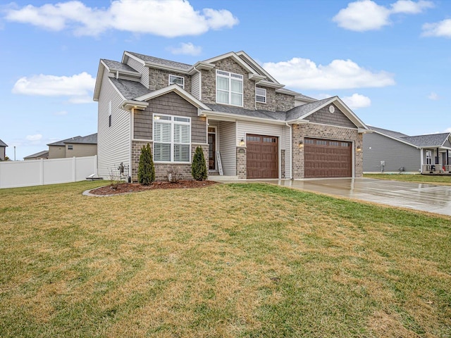 view of front facade featuring concrete driveway, fence, and a front lawn