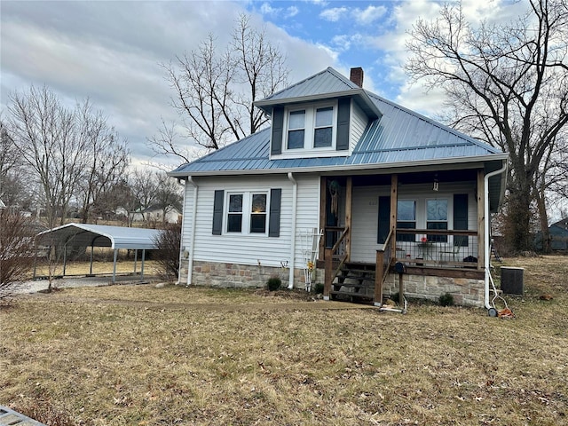 view of front of home featuring central AC unit, a front yard, a carport, and a porch