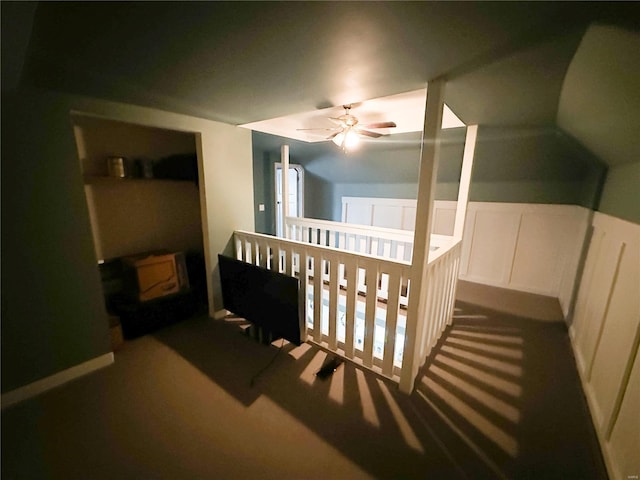 carpeted bedroom featuring ceiling fan and lofted ceiling