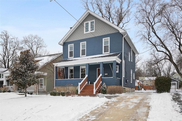 view of front of property featuring covered porch